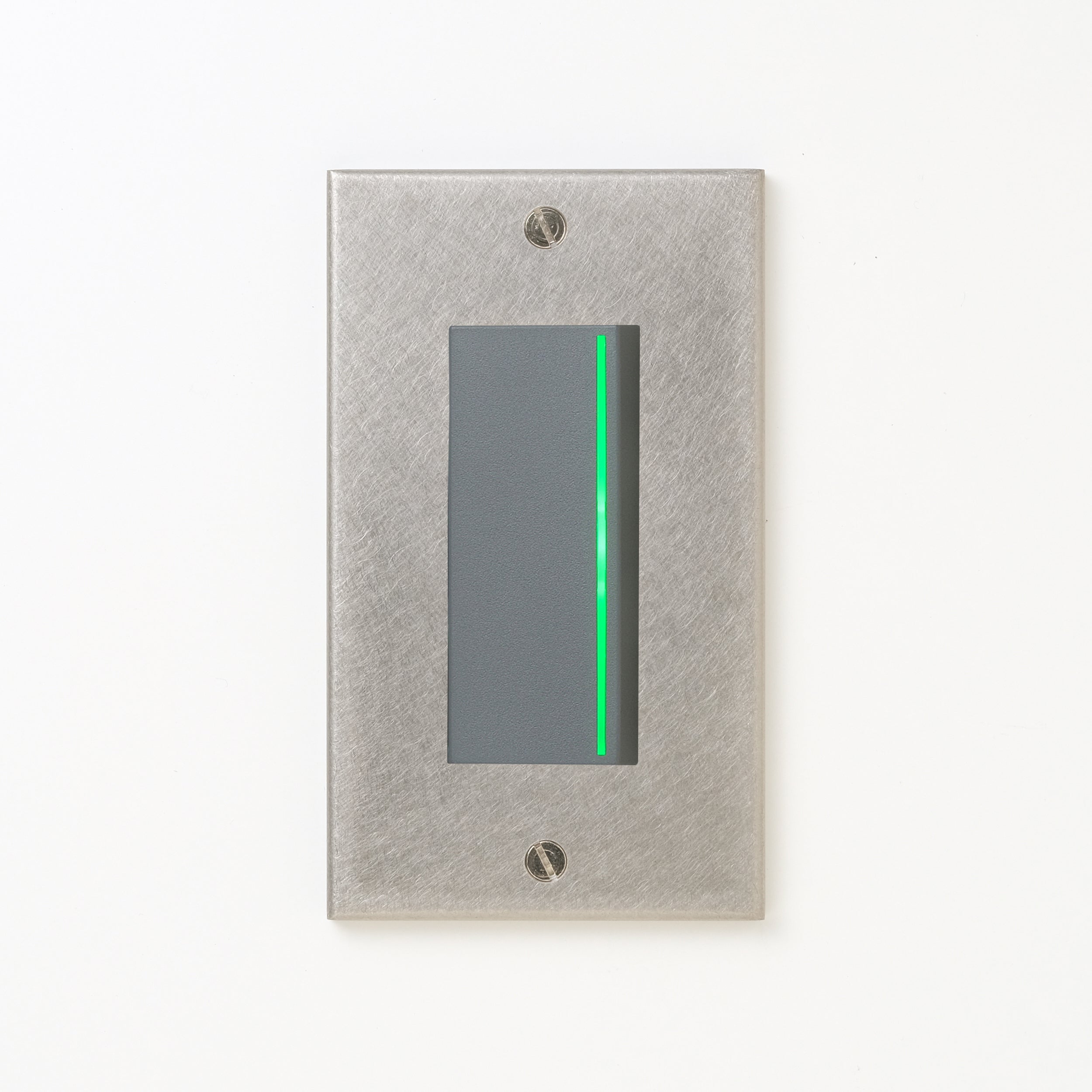 ステンレス（バイブレーション）プレート <br>+ NK 片切、3路ガイドランプ（グリーン）付スイッチシングル  グレー