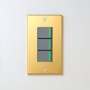 真鍮（素地） プレート <br>+ NK 片切、3路ガイドランプ（グリーン）スイッチトリプル  グレー