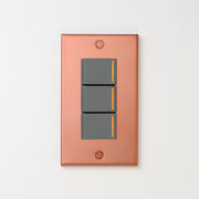 銅色（マット） プレート <br>+ NK 片切、3路チェックランプ（オレンジ）スイッチトリプル  グレー