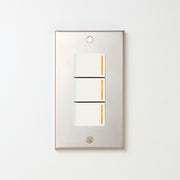 ステンレス素地 プレート <br>+ NK 片切、3路チェックランプ（オレンジ）スイッチトリプル  ホワイト